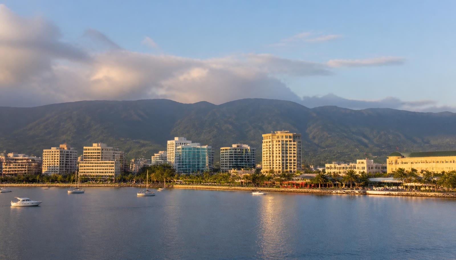 Kingston waterfront in late-afternoon light with the mountains behind